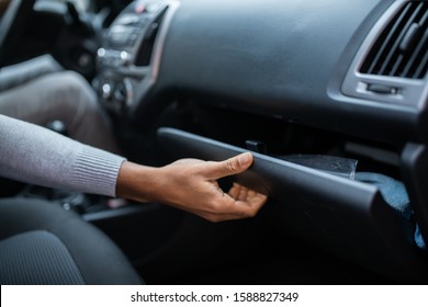 Driver Opening Empty Glovebox