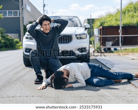 Driver panicking after causing a traffic accident
