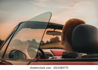 Driver in the red car