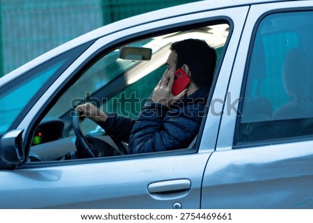 Driver talking on phone while operating vehicle