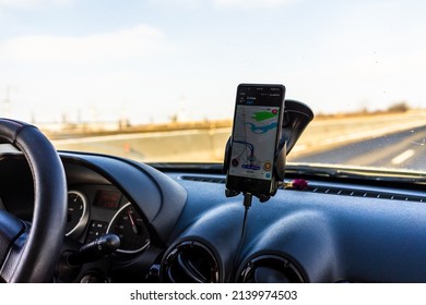 Driver Using Waze Maps App 260nw 2139974503 