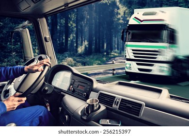 Driver View From The Cockpit Of A Truck On The Road