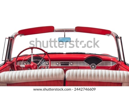 Driver view of a fifties American convertible car isolated on a white background