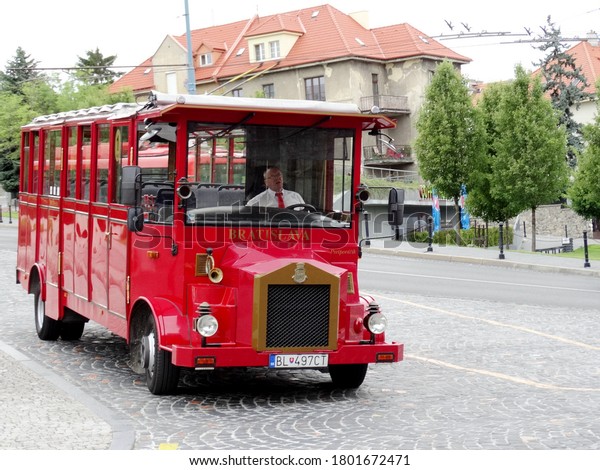 A driver is waiting for tourists in a sightseeing
tour car in Bratislava,Slovakia. Bratislava is the capital of
Slovakia. 2017-6