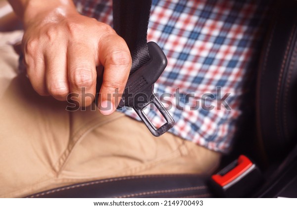 The driver wearing a seat belt Every time for\
safety road.