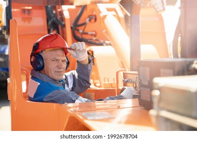 Driver Yellow Big Truck On Coal At Open Pit Mining. Concept Industry Man Worker.