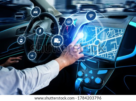 Driverless car interior with futuristic dashboard for autonomous control system . Inside view of cockpit HUD technology using AI artificial intelligence sensor to drive car without people driver .