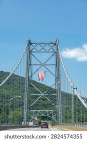 Drivers perspective view of Bear Mountain Bridge (Purple Heart Veterans Memorial Bridge) in New York State, USA a toll suspension bridge over the Hudson River with Routes 6 and 202