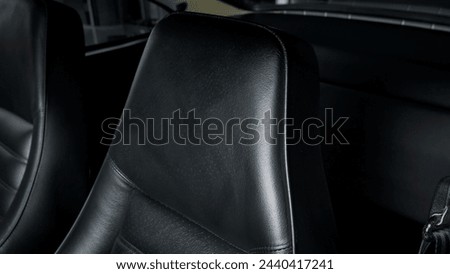 Drivers seat headrest in a car