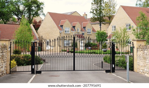 Driveway and Entrance of an Upscale Gated\
Community Housing\
Estate