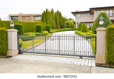 A Driveway To The Luxury House Behind The Gates In Suburbs Of Vancouver, Canada