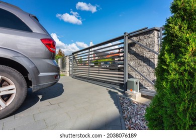 Driveway Of A Modern Single-family House With An Automatic Gate