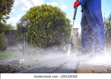 Driveway Pressure Wash. Cleaning Bricks Road And Garden Paths. 