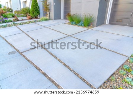 Driveways with concrete pavers and plants on the side at San Francisco, California