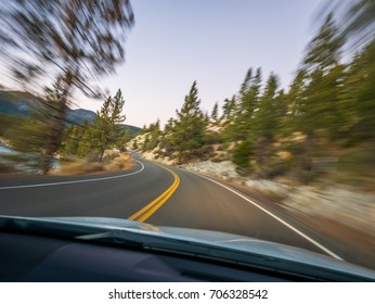 Driving Along Lake Tahoe On A Late Afternoon.