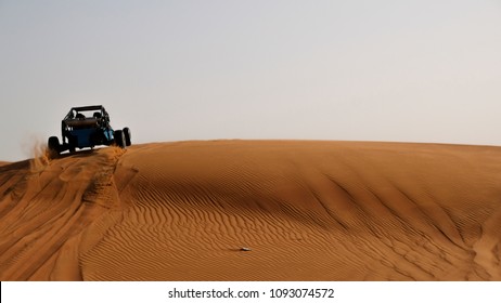 Driving a buggy in the Sweihan Desert in UAE