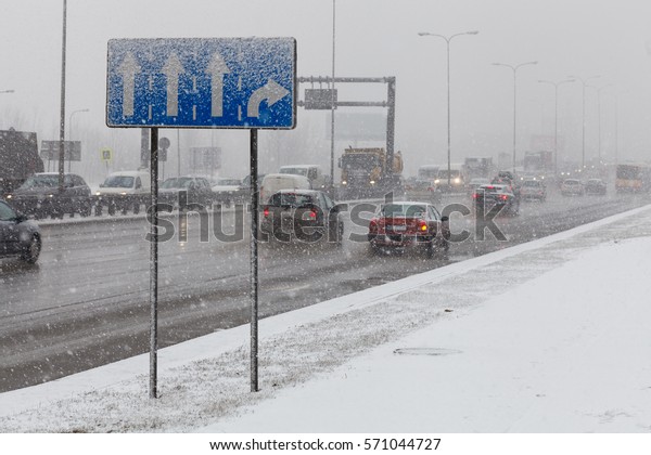 Driving\
a car in bad weather conditions during heavy\
snow