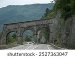 Driving car or camper on free road Route Napoleon in French Alps, touristic road in France, views from road