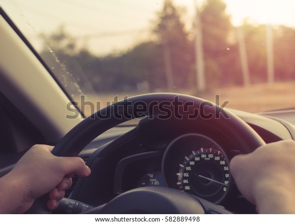 driving\
a car in good habit of people in city life\
style