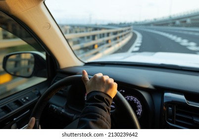 Driving car on highway in china - Shutterstock ID 2130239642