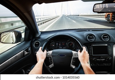 Driving car pov on a highway - Point of View, first person perspective - Shutterstock ID 1014035560