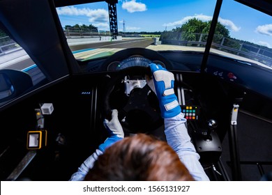 Driving A Car In A Race Simulator