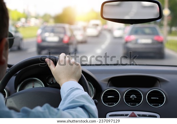 Driving a car in rush\
hour