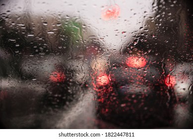 Driving Car In Trafic Jam In City While Its Raining And Storm