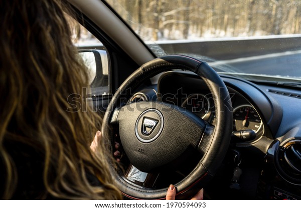 Driving\
Dacia, close up of dashboard, steering wheel with air bag sign.\
View of car interior in Bucharest, Romania,\
2021