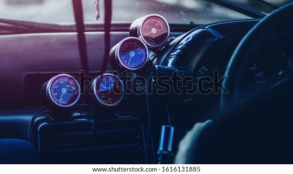 Driving a\
drift car through the night city. Neon\
toning