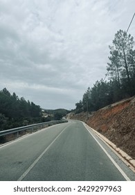 Driving empty road in the mountains