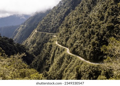 Driving the famous death road, the "Camino de la Muerte", in the Bolivian Andes near La Paz - traveling and exploring the Yungas - Powered by Shutterstock