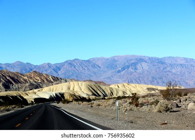 driving in the historical route 66 near Death Valley in Nevada in USA.