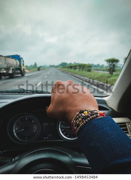 driving on Indian\
highways in the early\
morning