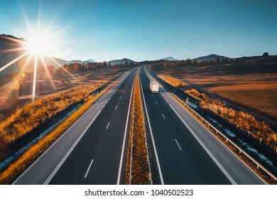 Driving On Open Road At Beautiful Sunny Day. Aerial Drone View