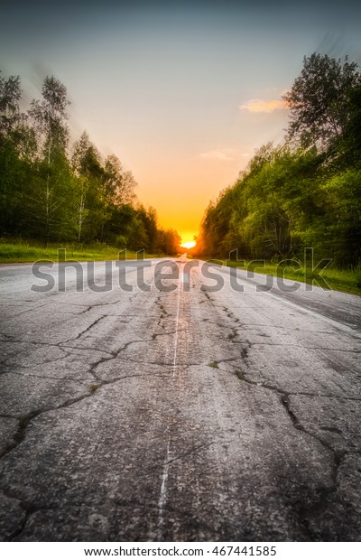Driving on the\
road at high speed towards the\
sun