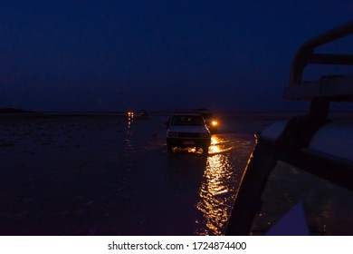 Driving Over Salt Flats By 4x4 At Night In Danakil Desert, Ethiopia