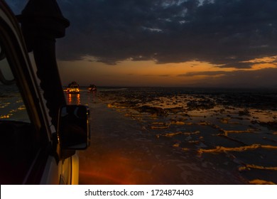 Driving Over Salt Flats By 4x4 At Night In Danakil Desert, Ethiopia