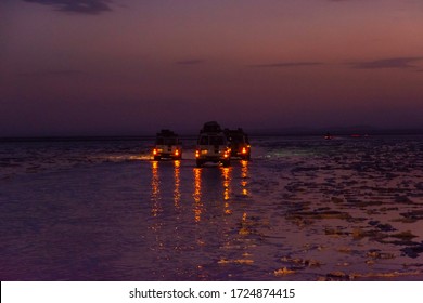 Driving Over Salt Flats By 4x4 At Night In Danakil Desert, Ethiopia