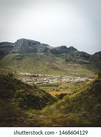 Driving Past A Small Mountain Town In Arizona