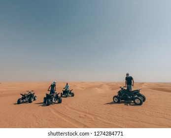 Driving Quad In The Desert Of Dubai