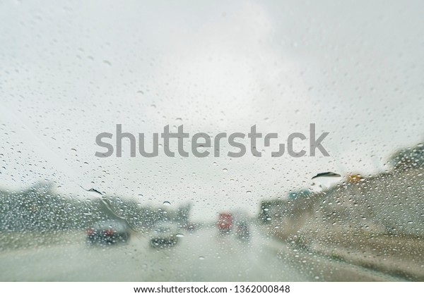 Driving in\
the rainy Los Angeles urban at\
California