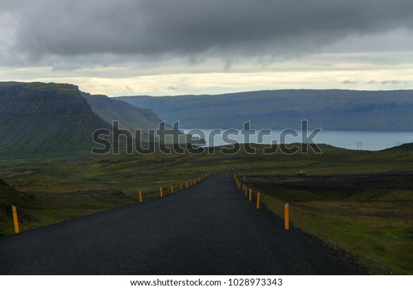 Driving the Ring\
Road in Iceland, Beautiful view in the Road trip Westfjords in\
Iceland, Season\
summertime