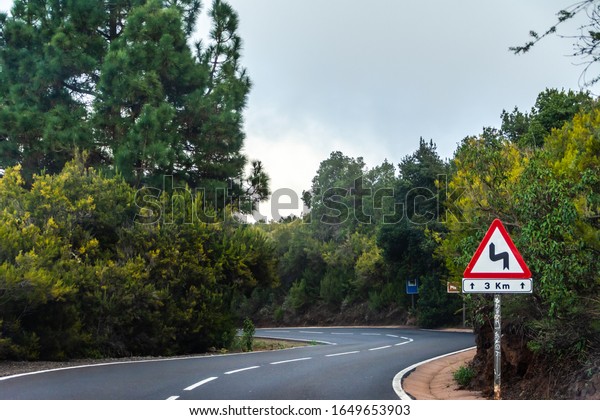 Driving route for car trip through the\
forest. Alpine road in Teide national\
park.