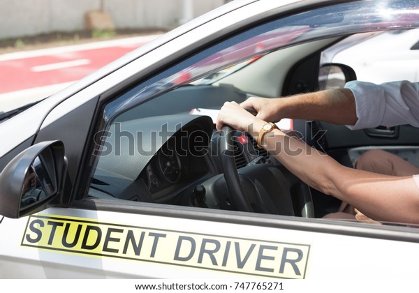 Driving school. Learning
to drive a car.
