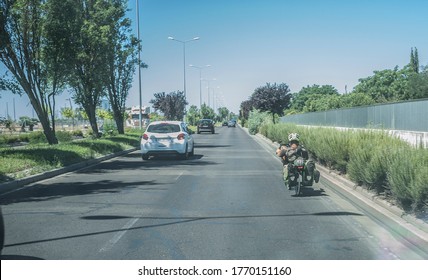 Driving slowly behind recumbent bicycle. View from the inside of the car - Powered by Shutterstock