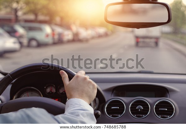 Driving in the sun on a\
car