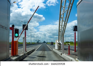 Driving Through Toll Booth On The Highway