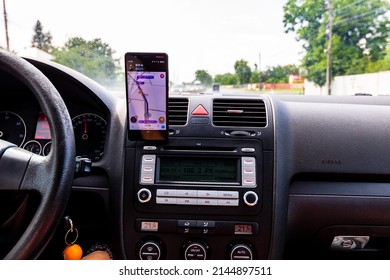 Driving Using Waze Maps Application 260nw 2144897511 