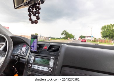 Driving Using Waze Maps Application 260nw 2145270581 
